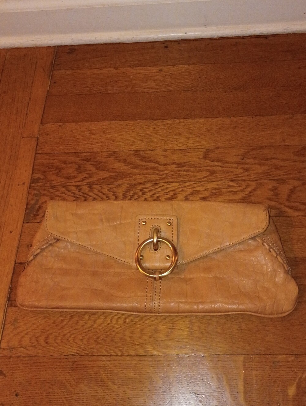 beige magnetic close clutch bag from kenneth cole office